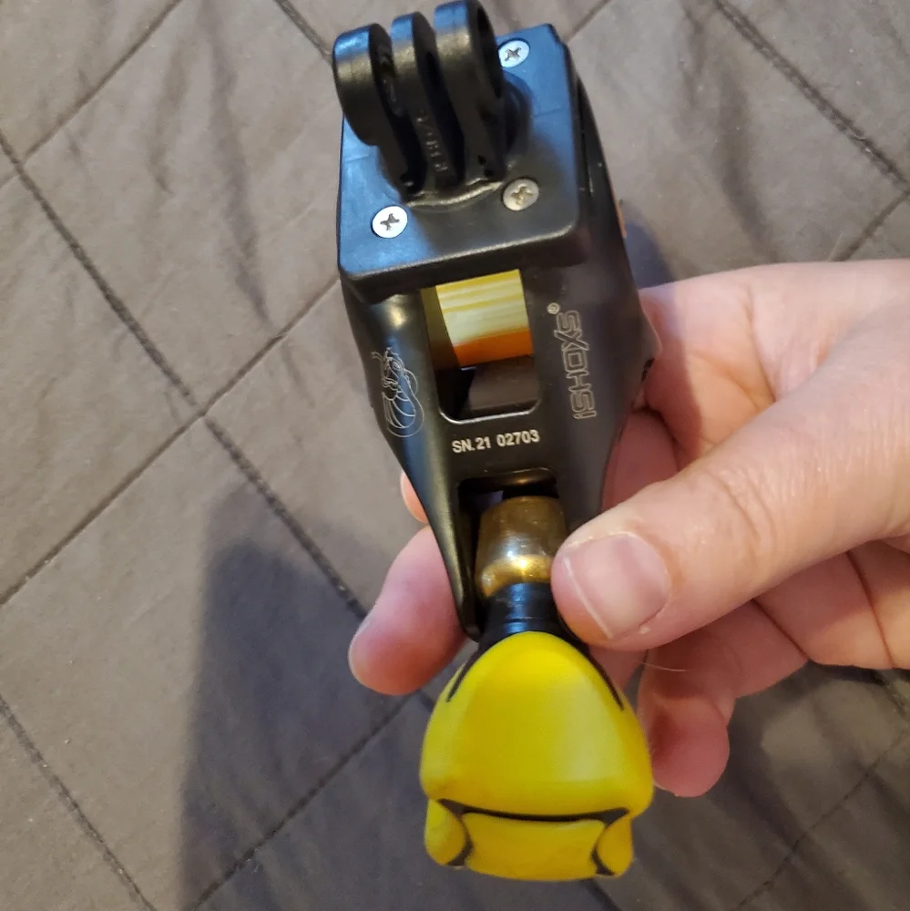 Yellow and Black Camera Tripod Clamp